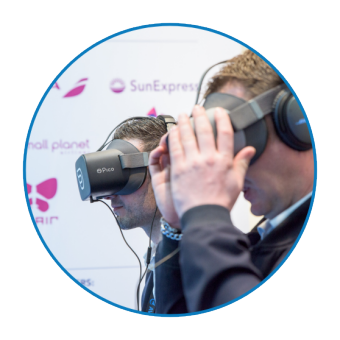 Two men wearing virtual reality glasses