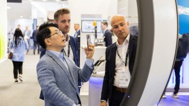 a man scanning qr with his phone